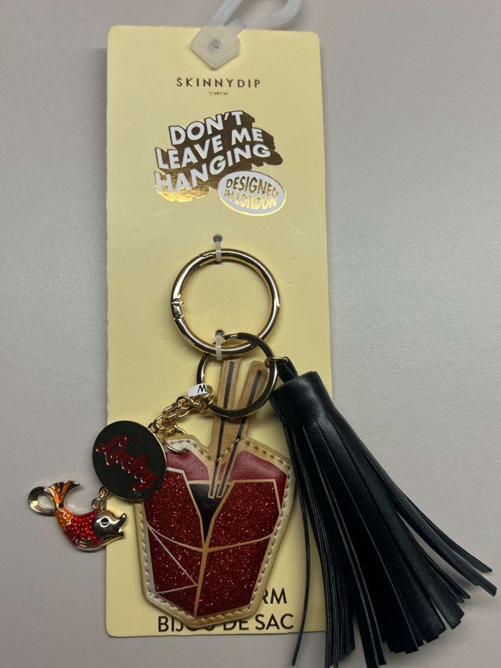 Skinny Dip Black Tassel & Red Glitter Charm Keyring